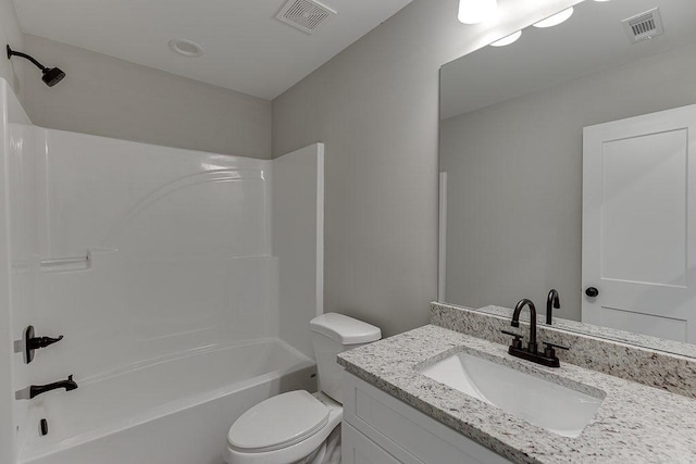 bathroom featuring toilet, tub / shower combination, vanity, and visible vents