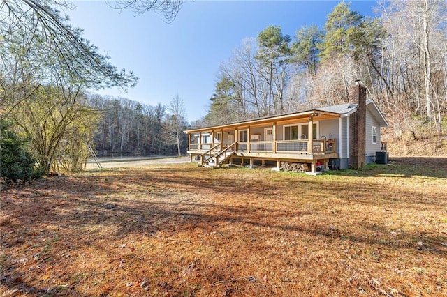 view of front of home with a front lawn and a porch