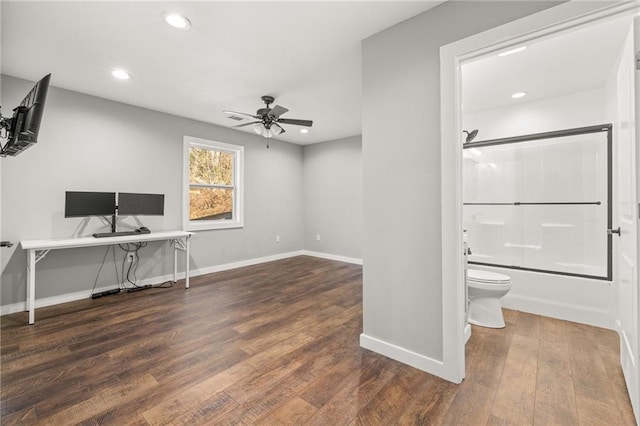 office featuring dark hardwood / wood-style flooring and ceiling fan