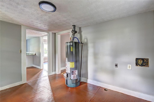utility room featuring water heater