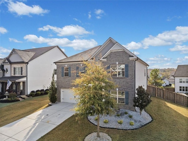 view of front of home featuring a garage and a front lawn