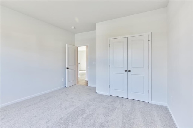 650 Cayenne Way, Lawrenceville, GA 30045 - unfurnished bedroom with carpet, baseboards, and a closet