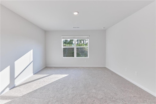 650 Cayenne Way, Lawrenceville, GA 30045 - empty room featuring light carpet, baseboards, and recessed lighting