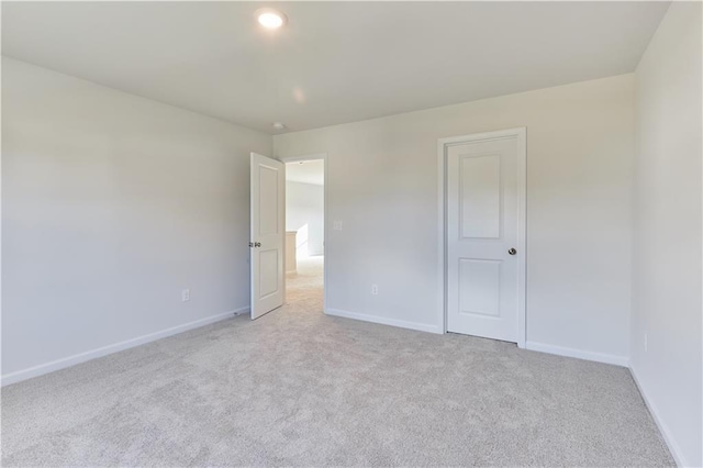 650 Cayenne Way, Lawrenceville, GA 30045 - unfurnished bedroom featuring light carpet, baseboards, and recessed lighting