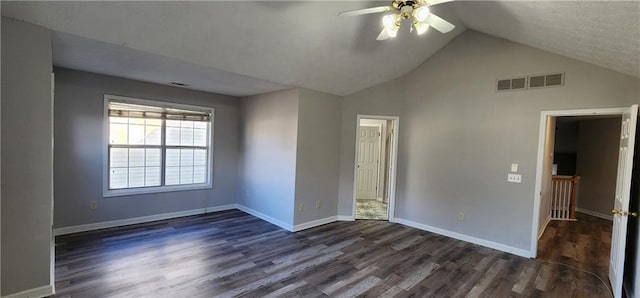 1230 Chris Lake Dr, Lawrenceville, GA 30046 - unfurnished bedroom with dark wood-style flooring, lofted ceiling, baseboards, and a ceiling fan