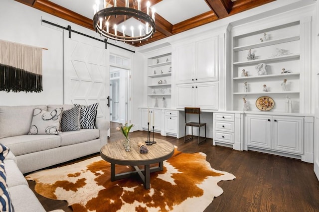 living room featuring coffered ceiling, built in desk, beamed ceiling, a barn door, and dark hardwood / wood-style flooring