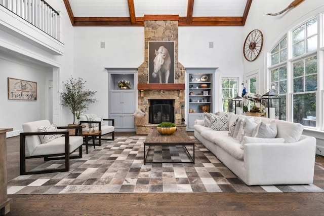 living room with wooden ceiling, a stone fireplace, high vaulted ceiling, and dark hardwood / wood-style flooring