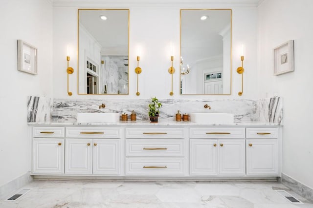 bathroom featuring vanity, crown molding, and backsplash