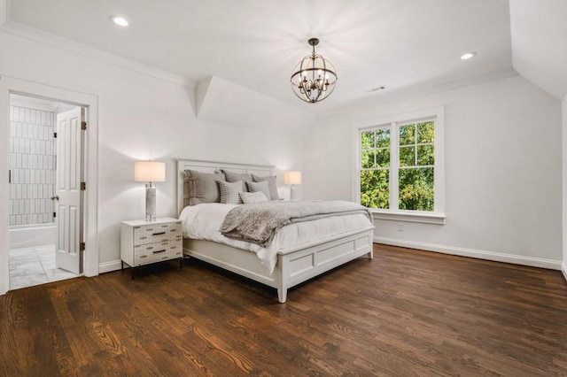 bedroom featuring dark wood-type flooring, crown molding, vaulted ceiling, a notable chandelier, and ensuite bathroom