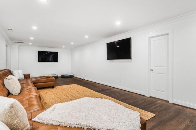 living room with crown molding and dark hardwood / wood-style floors