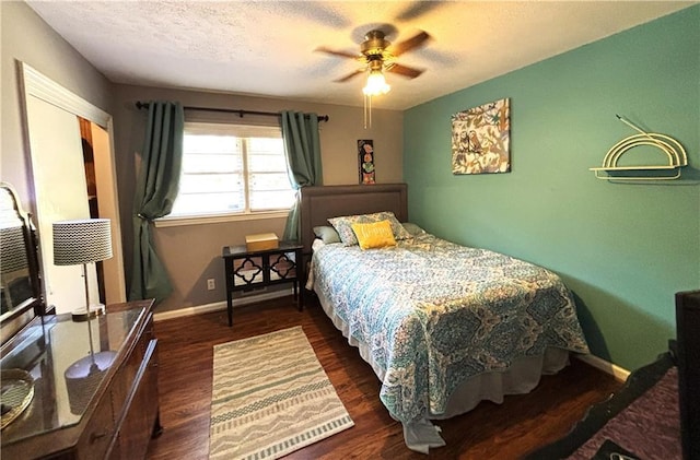4519 Sims Ct, Tucker, GA 30084 - bedroom with baseboards, a textured ceiling, ceiling fan, and wood finished floors
