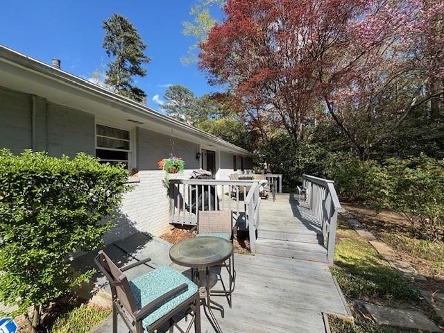 4519 Sims Ct, Tucker, GA 30084 - wooden deck with outdoor dining space