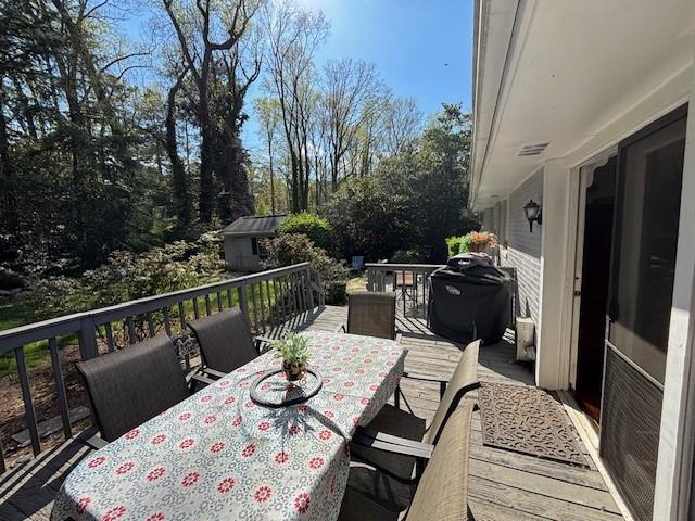 4519 Sims Ct, Tucker, GA 30084 - deck featuring outdoor dining area