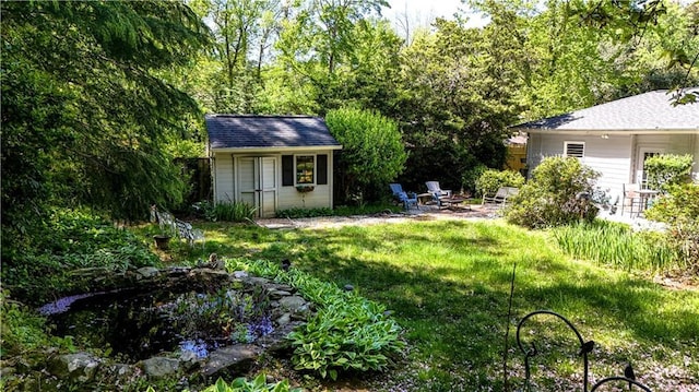 4519 Sims Ct, Tucker, GA 30084 - view of yard with a storage shed and an outbuilding