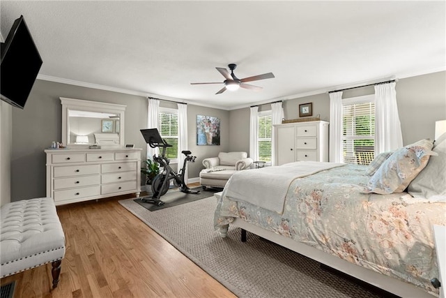 322 Windy Ridge Dr, Demorest, GA 30535 - bedroom featuring ornamental molding, wood finished floors, and ceiling fan