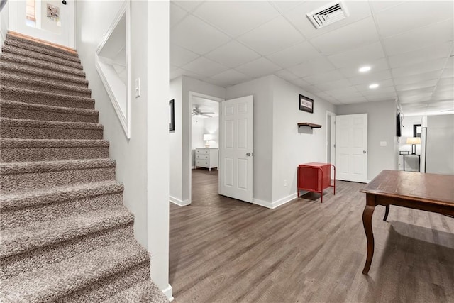 322 Windy Ridge Dr, Demorest, GA 30535 - stairway with wood finished floors, a paneled ceiling, and recessed lighting