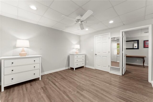 322 Windy Ridge Dr, Demorest, GA 30535 - unfurnished bedroom featuring a drop ceiling, wood finished floors, recessed lighting, and a ceiling fan