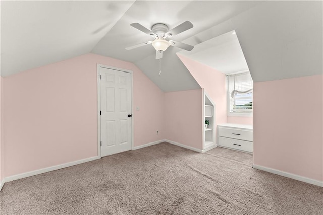322 Windy Ridge Dr, Demorest, GA 30535 - additional living space with light colored carpet, lofted ceiling, and ceiling fan