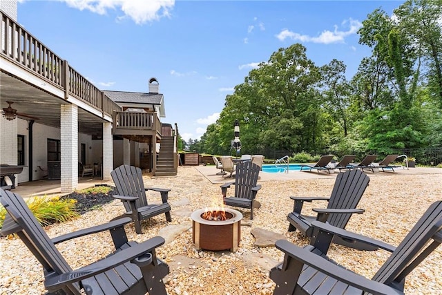 322 Windy Ridge Dr, Demorest, GA 30535 - view of patio featuring an outdoor fire pit, stairs, and a deck