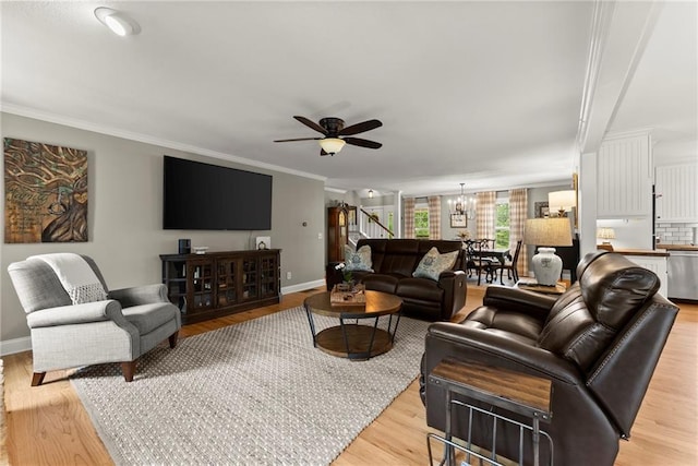 322 Windy Ridge Dr, Demorest, GA 30535 - living room with a chandelier, ceiling fan, crown molding, light wood-type flooring, and stairs