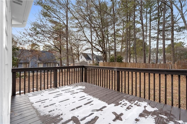 view of snow covered deck