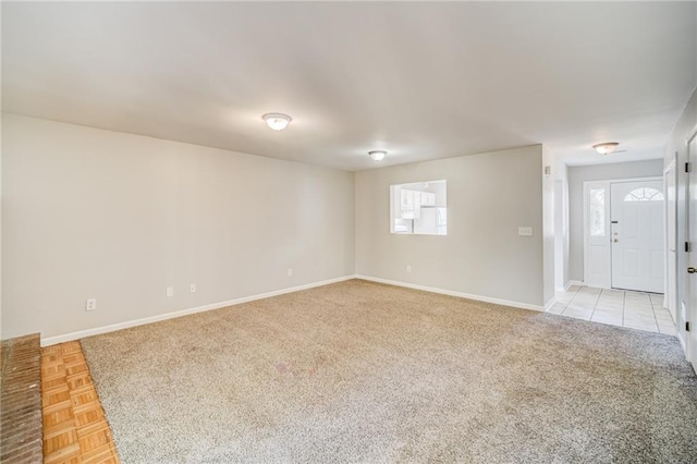 unfurnished room featuring light parquet flooring