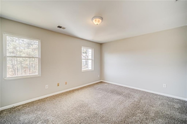 view of carpeted spare room