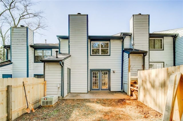 back of house with a patio