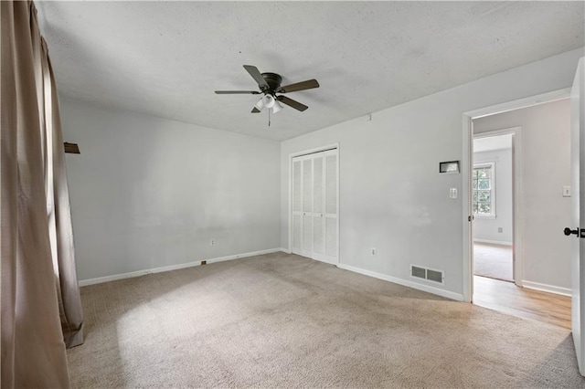 120 Lakeside Dr, Ellenwood, GA 30294 - unfurnished room featuring ceiling fan, carpet floors, and a textured ceiling