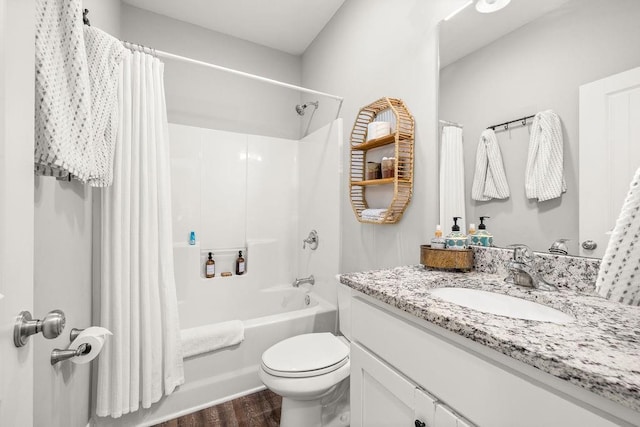 full bathroom with shower / bath combo, vanity, toilet, and wood finished floors