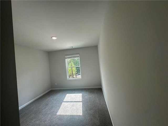 45 Emerald Ln, Covington, GA 30014 - spare room with carpet flooring, baseboards, and recessed lighting
