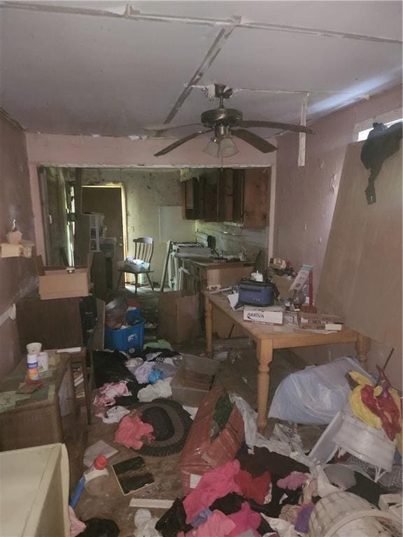 misc room with a ceiling fan
