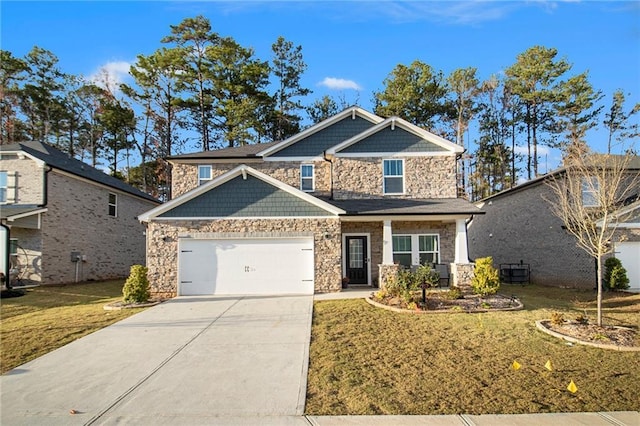 craftsman inspired home featuring a front lawn and a garage