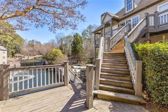 wooden deck featuring stairs