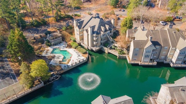 aerial view with a residential view and a water view