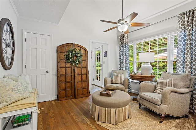 4792 Fairville Ct, Marietta, GA 30062 - living area with wood finished floors, ceiling fan, vaulted ceiling, and crown molding