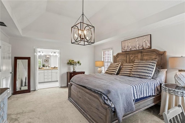 4792 Fairville Ct, Marietta, GA 30062 - bedroom featuring a raised ceiling, a chandelier, light colored carpet, and ensuite bath