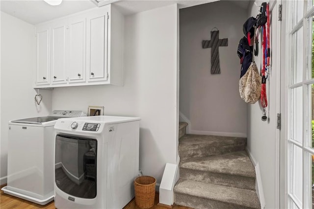 4792 Fairville Ct, Marietta, GA 30062 - laundry room featuring baseboards, cabinet space, and washer and dryer