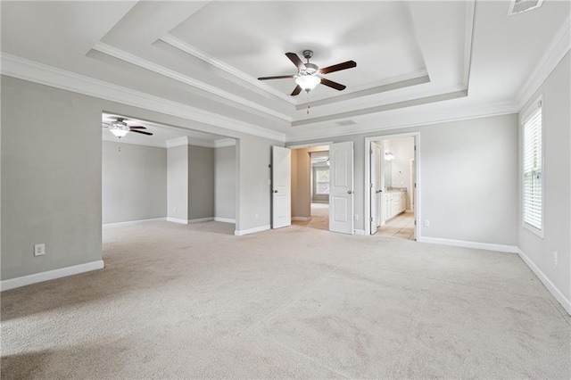 4090 Danbury Farms Dr, Cumming, GA 30040 - unfurnished bedroom with a tray ceiling, light colored carpet, crown molding, and baseboards