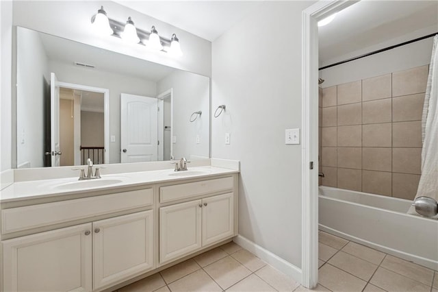 4090 Danbury Farms Dr, Cumming, GA 30040 - bathroom featuring tile patterned floors, double vanity, shower / tub combo with curtain, and baseboards