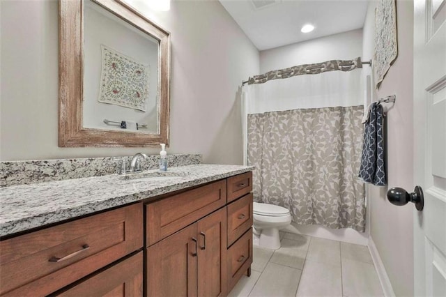 bathroom featuring tile patterned floors, walk in shower, vanity, and toilet