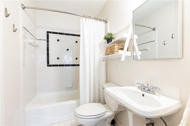 full bathroom featuring shower / bathtub combination with curtain, sink, and toilet