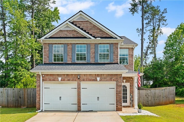 154 Stephens Mill Dr, Dallas, GA 30157 - view of front of home with driveway, a garage, brick siding, and roof with shingles