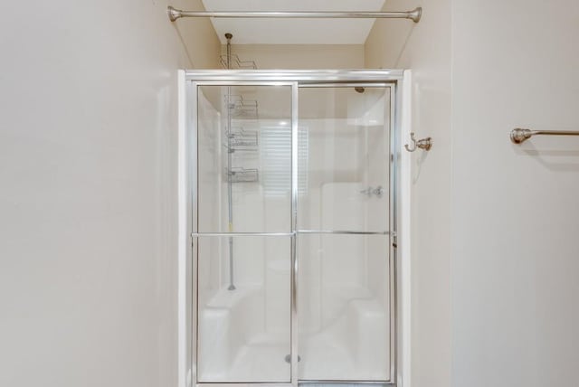 bathroom with an enclosed shower