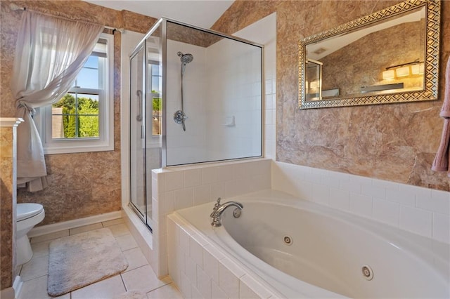 full bathroom featuring toilet, tile patterned floors, a whirlpool tub, and a stall shower
