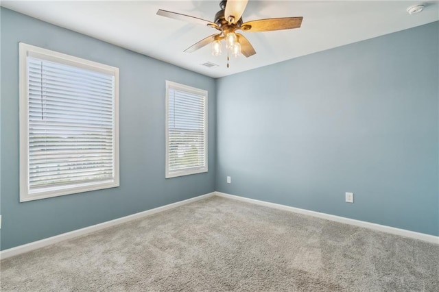 unfurnished room featuring carpet flooring and ceiling fan