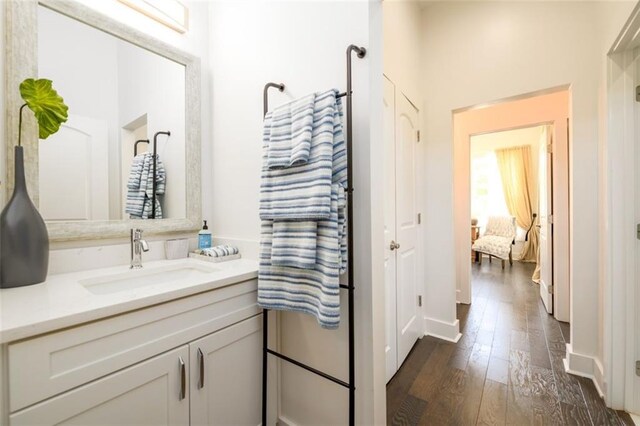 400 Fox Valley Dr, Monroe, GA 30656 - ensuite bathroom featuring hardwood / wood-style floors and vanity