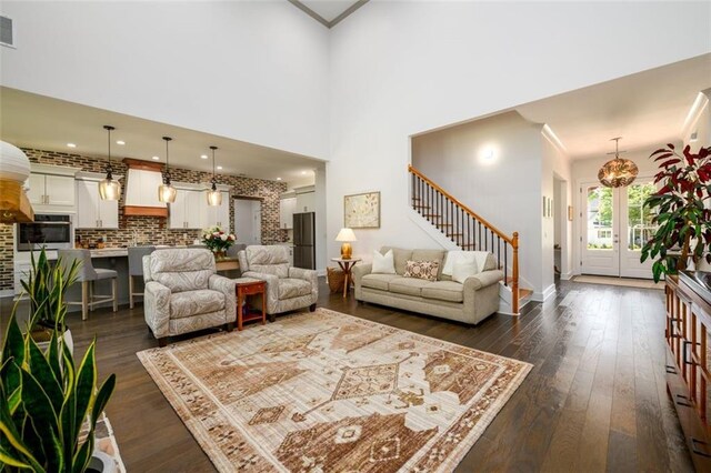400 Fox Valley Dr, Monroe, GA 30656 - living area with stairway and dark wood-style flooring