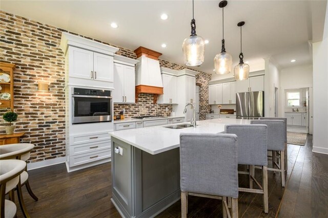 400 Fox Valley Dr, Monroe, GA 30656 - kitchen featuring stainless steel appliances, a sink, dark wood-style floors, light countertops, and recessed lighting
