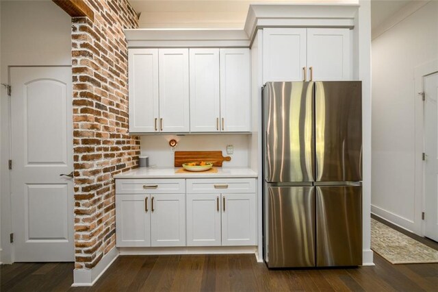 400 Fox Valley Dr, Monroe, GA 30656 - kitchen with freestanding refrigerator, light countertops, dark wood-style floors, and white cabinetry